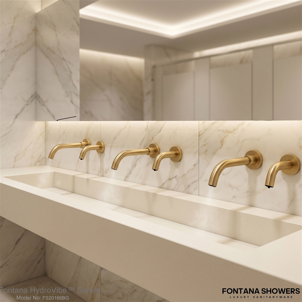 Brushed gold Fontana sensor faucet selected for an upscale hospitality restroom upgrade
