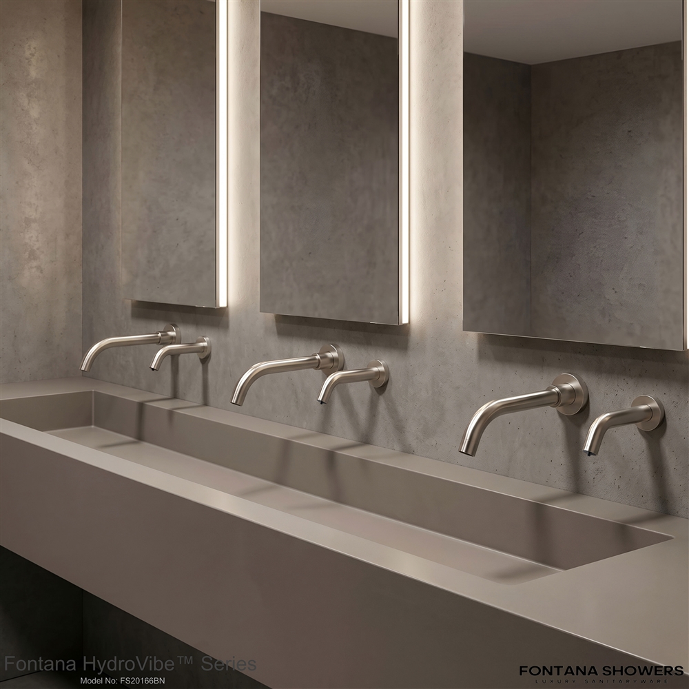 Airport or public restroom using commercial touchless plumbing fixtures