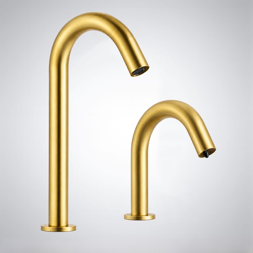 Chrome sensor faucets over a dark trough sink illustrating sensor spacing and reflective counter conditions